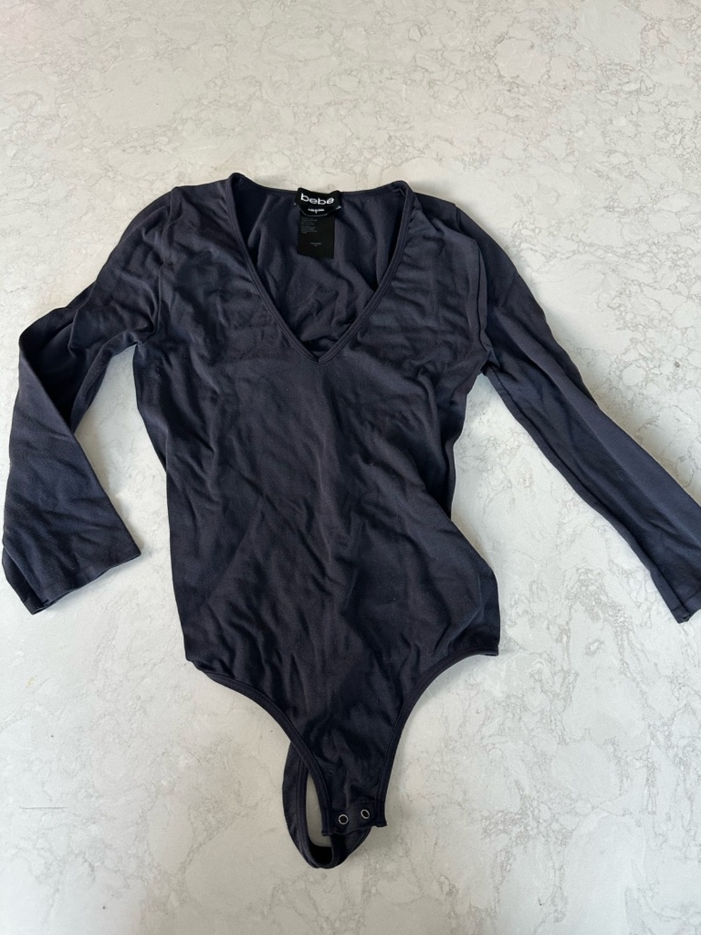 Seamless size small Bebe bodysuit in navy blue